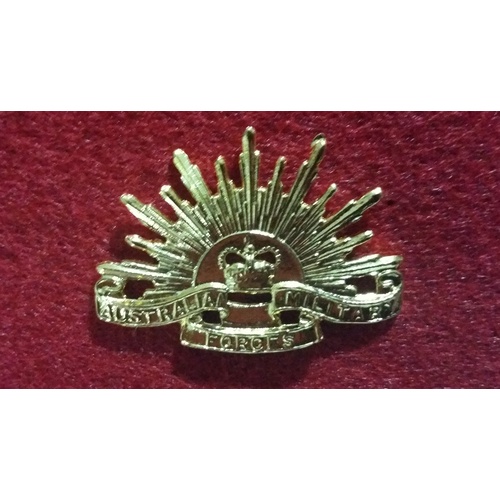 SMALL RISING SUN COLLAR BADGE - VIETNAM ERA QC AMF 1954-1990
